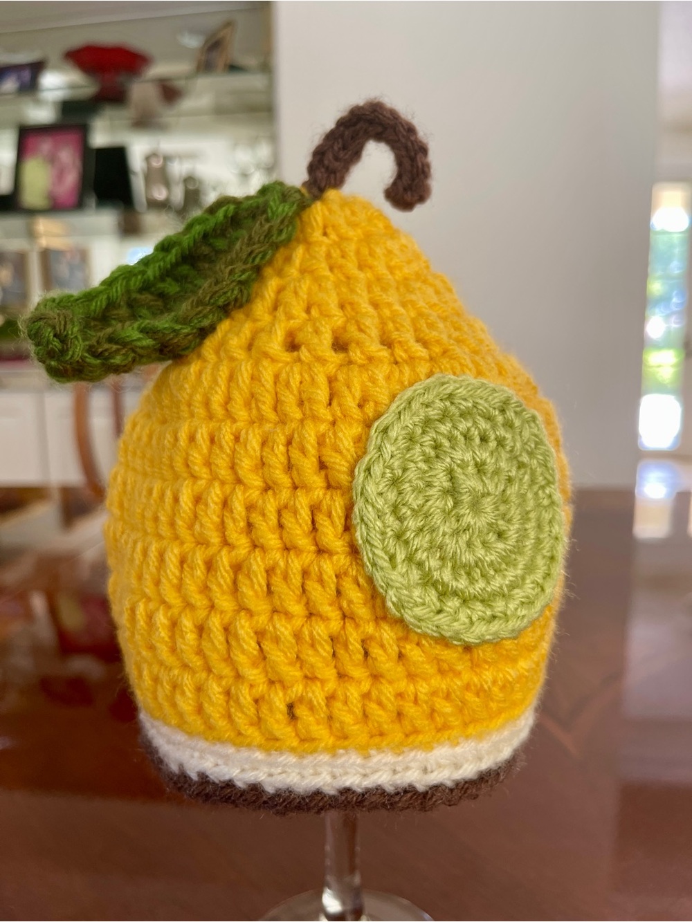 Handmade Yellow Crochet Pear Baby Hat with Leaf Accent - Picture 4 of 6